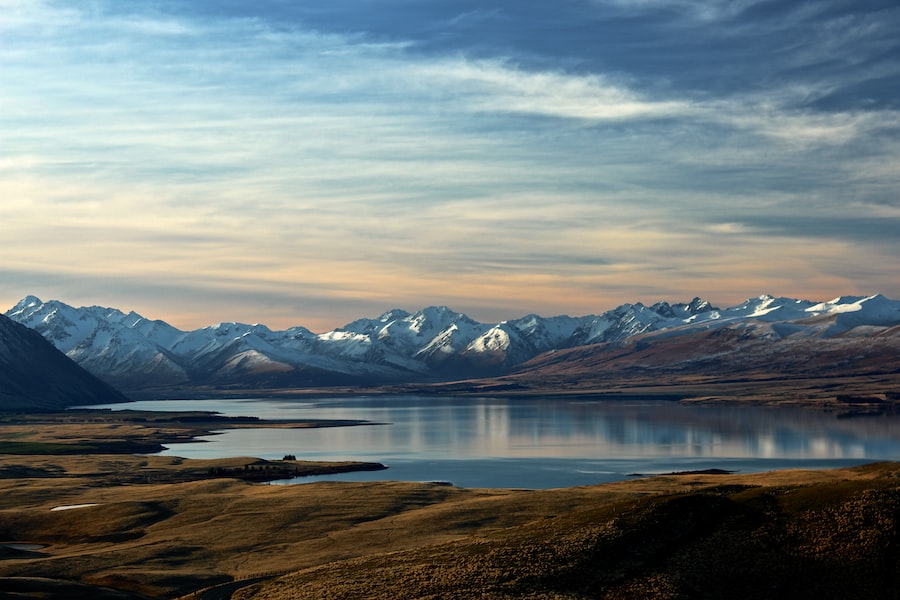A Lake With Mountains In The Background 