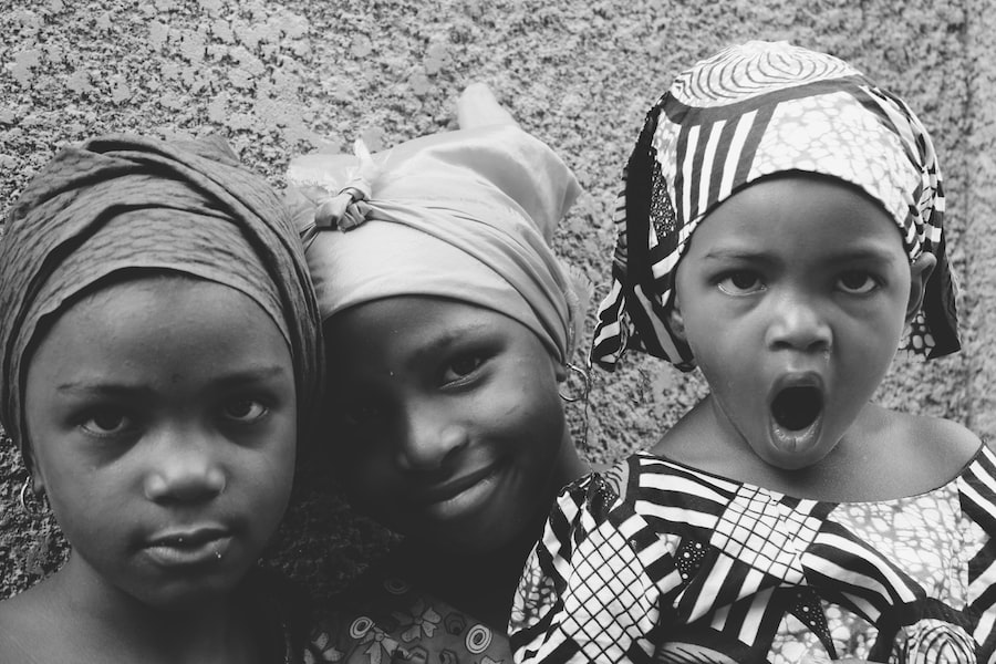 A Group Of Young Girls With Their Mouths Open